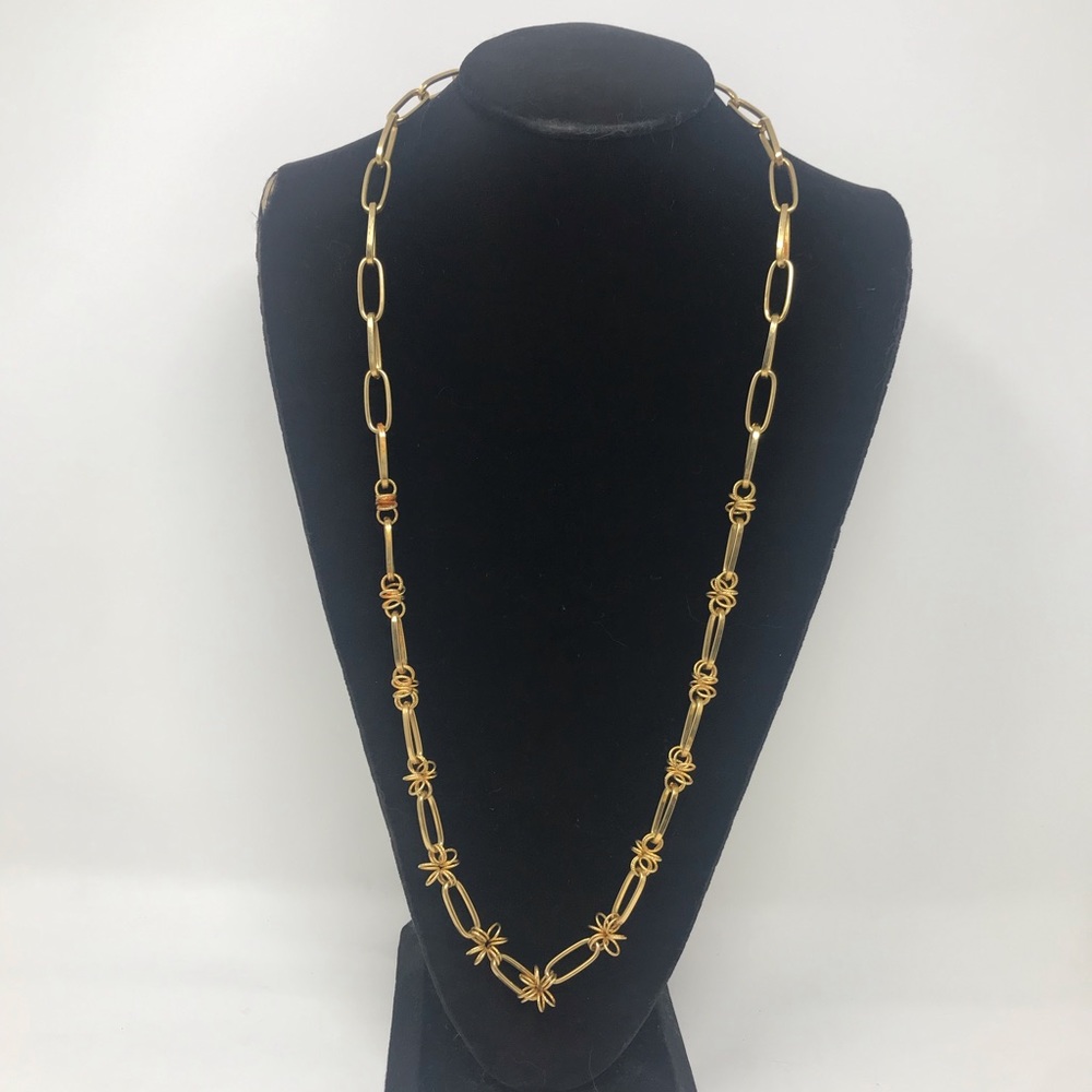 Gold tone knot (flower) chain